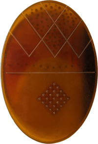 Untitled (Amber Ellipse with embedded diamond)