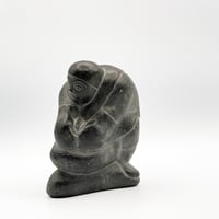 Kneeling Figure
