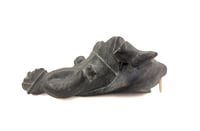 Large Carving of Inuit pulling Walrus Head