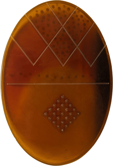 Untitled (Amber Ellipse with embedded diamond)